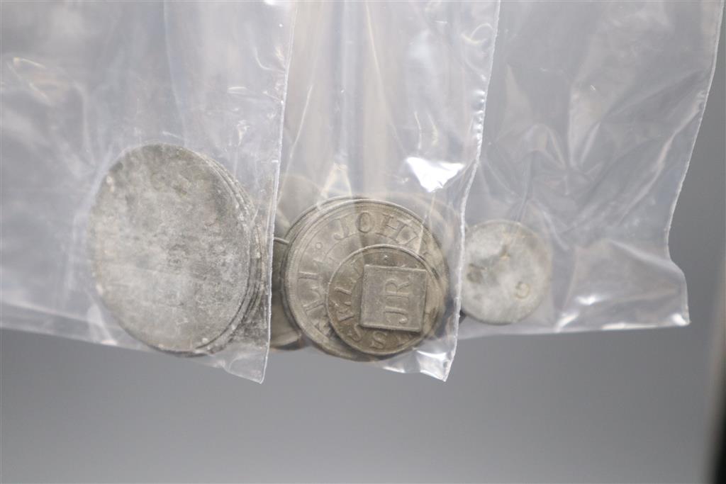 A large collection of 19th century Sussex and Kent hop tokens, approximately 128